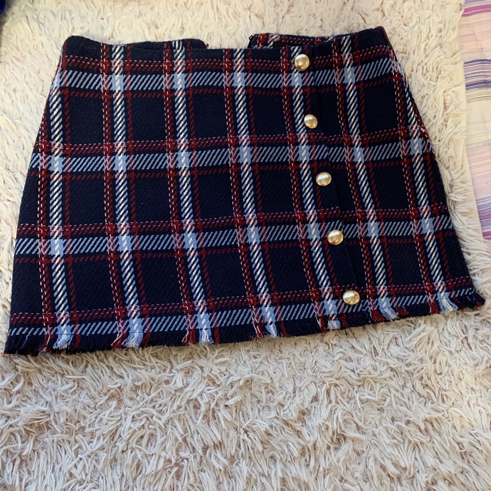 Plaid skirt.